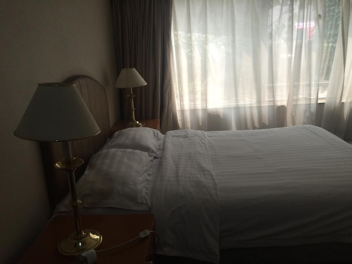 Beijing New World Centre Aparthotel Eksteriør billede